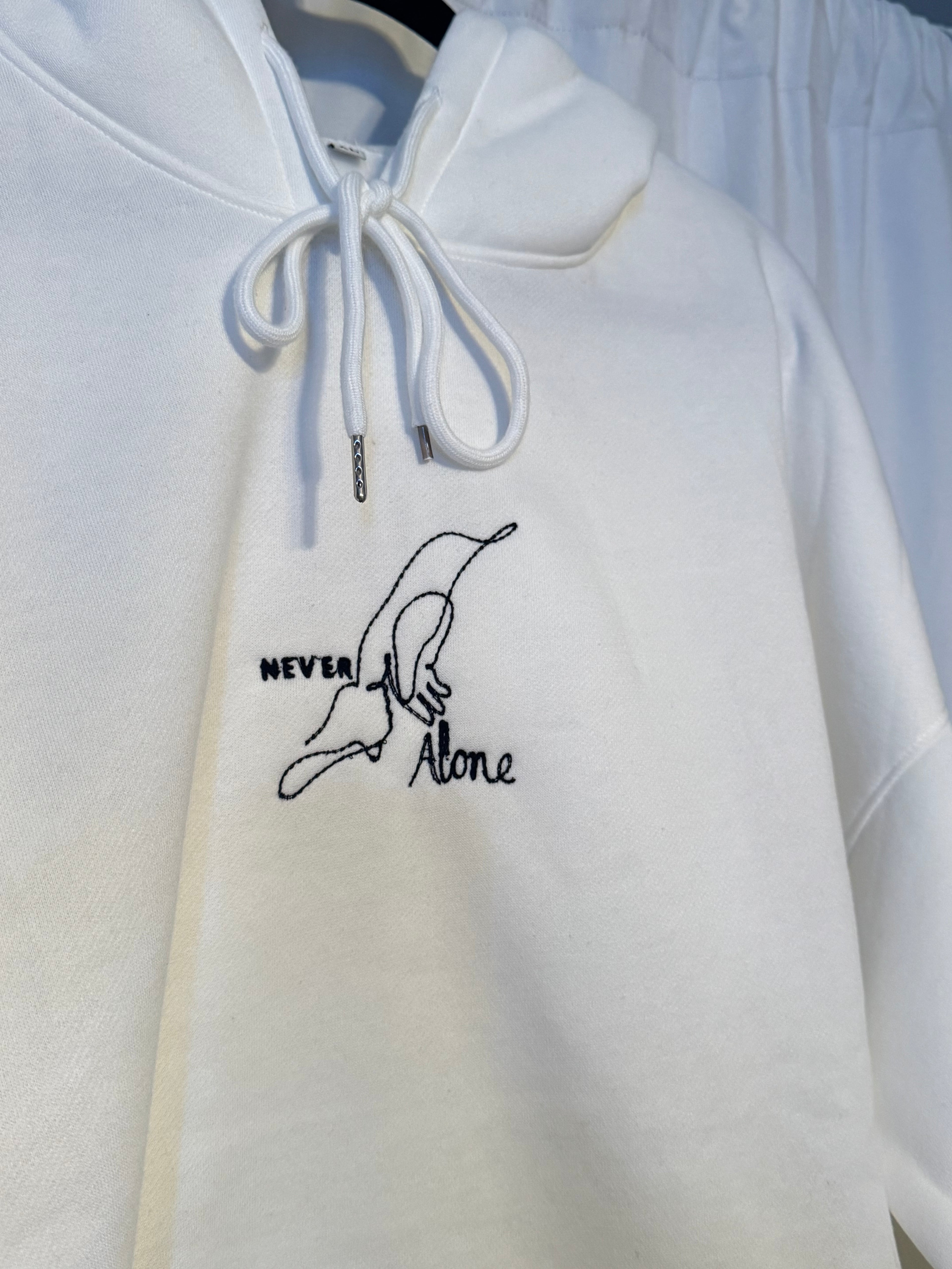 Never Alone Hoodie (holding jesus finger)