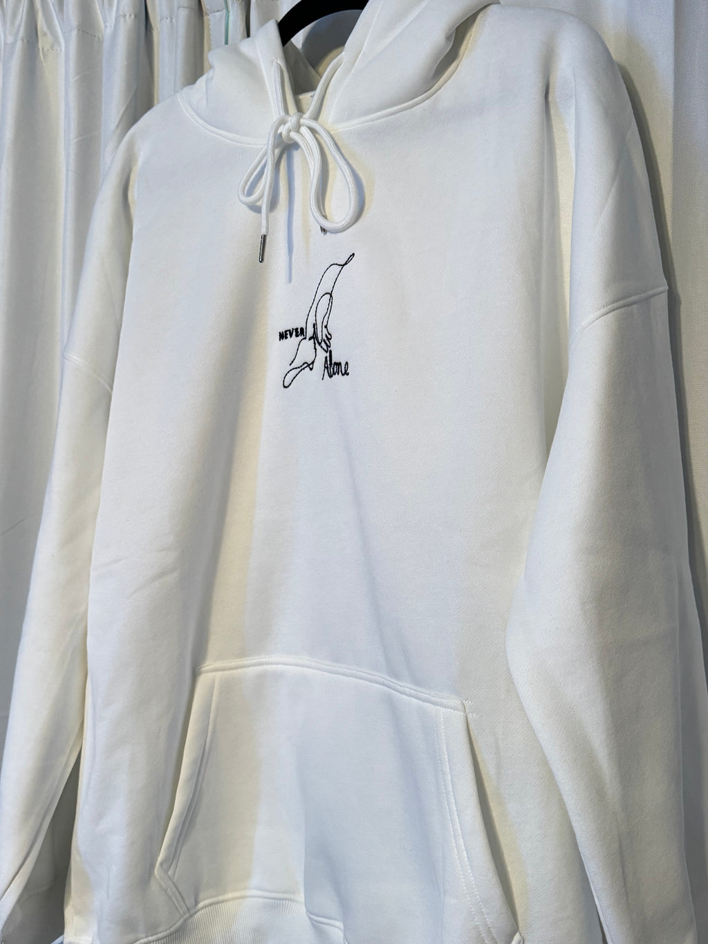 Never Alone Hoodie (holding jesus finger)